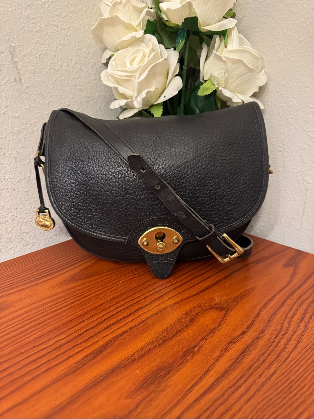 Vintage Dooney & Bourke Black Pebble Leather Saddle Crossbody with Gold Hardware